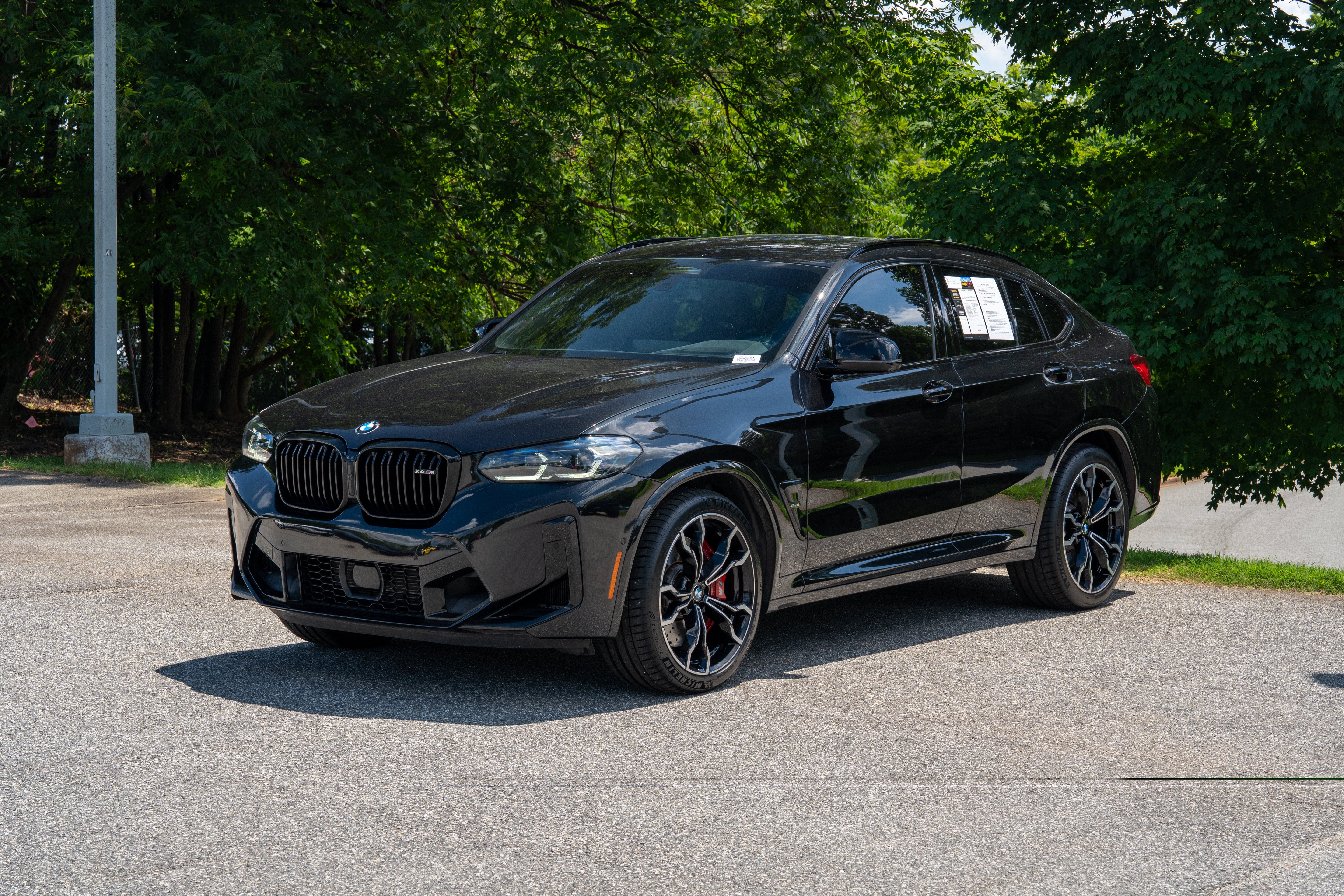 Used 2024 Black Sapphire Metallic BMW Competition image 3