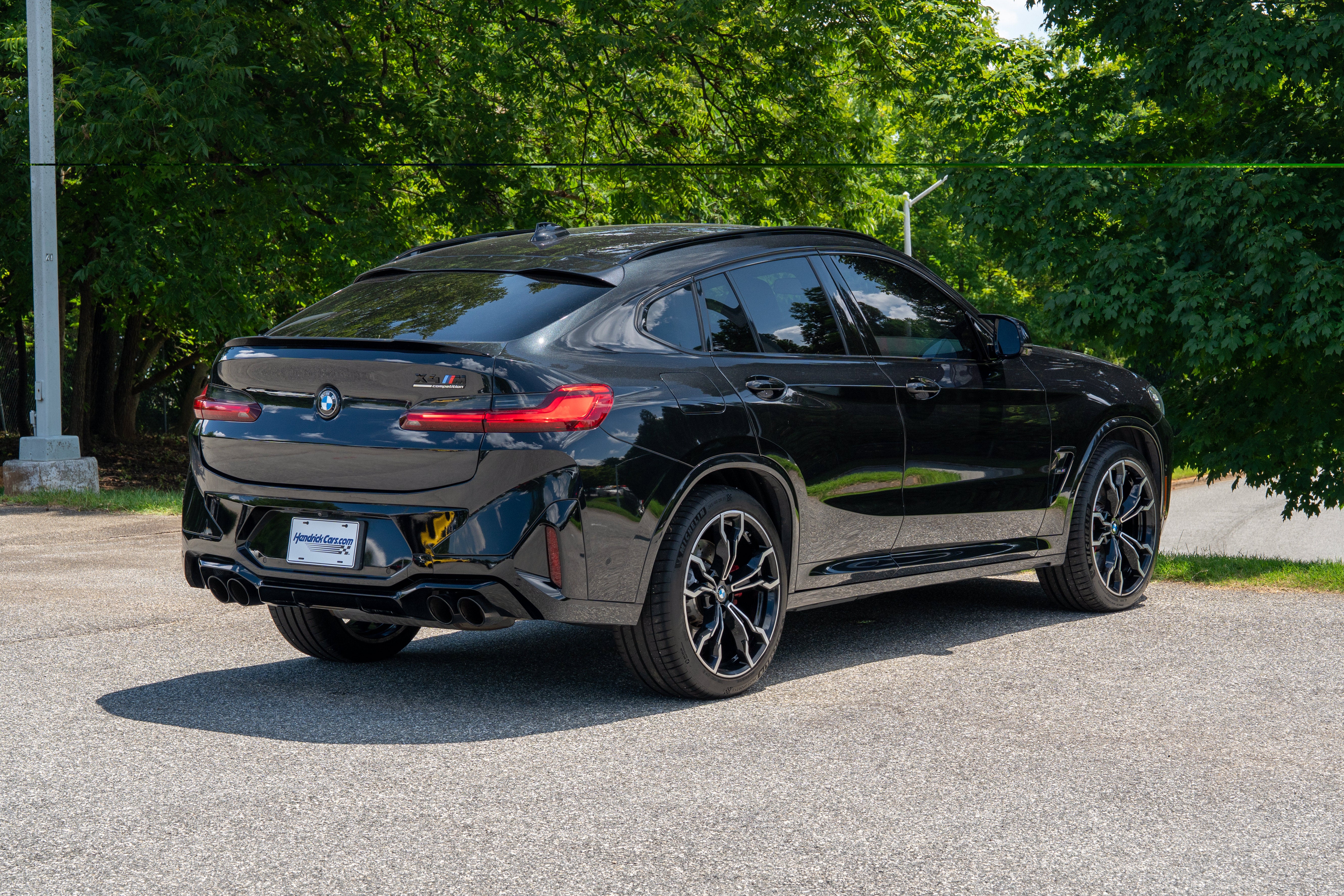 Used 2024 Black Sapphire Metallic BMW Competition image 8