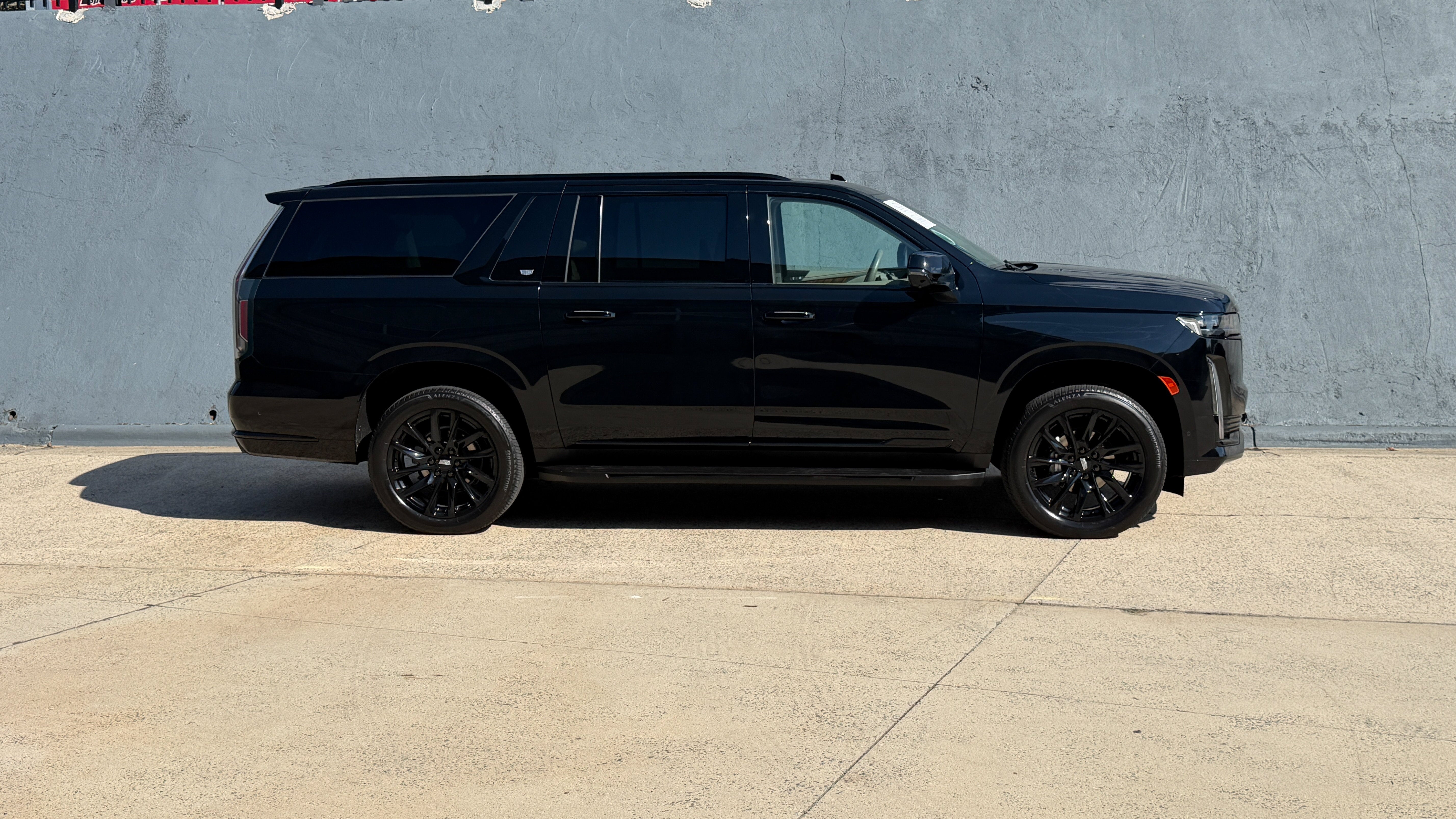 Used 2024 Black Raven Cadillac 4WD Sport Platinum image 2