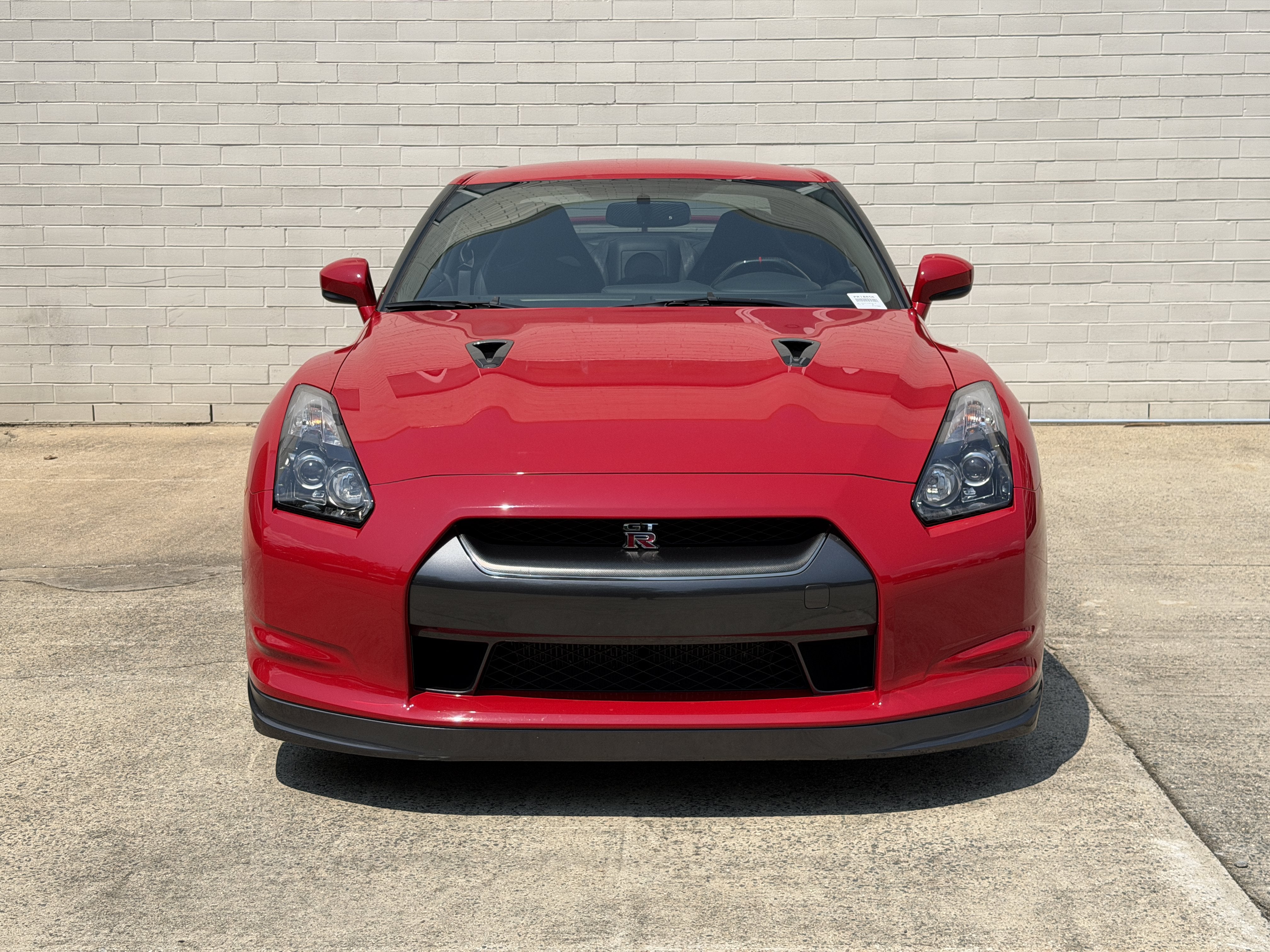 Used 2010 Solid Red Nissan Premium image 5