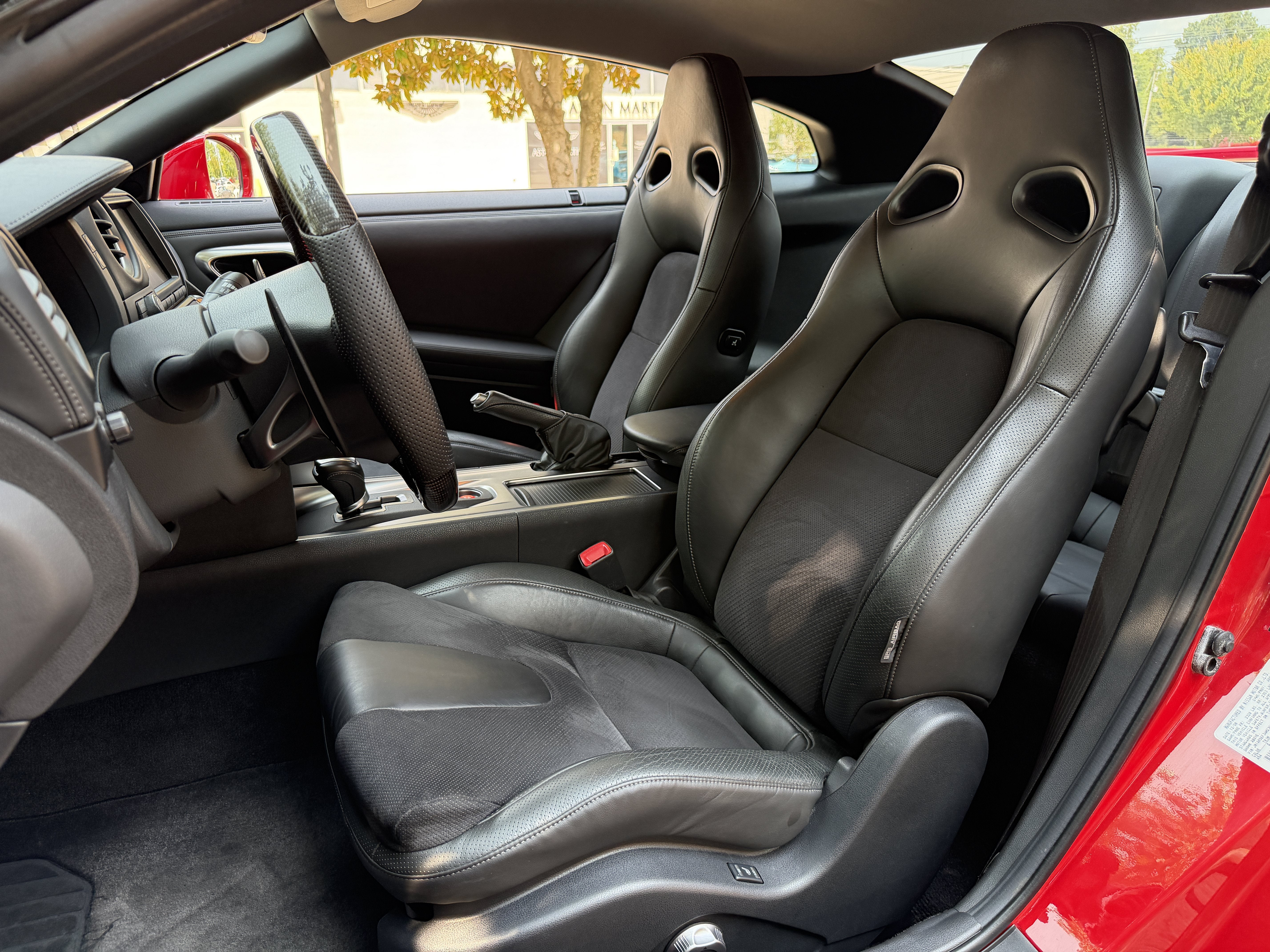 Used 2010 Solid Red Nissan Premium image 16