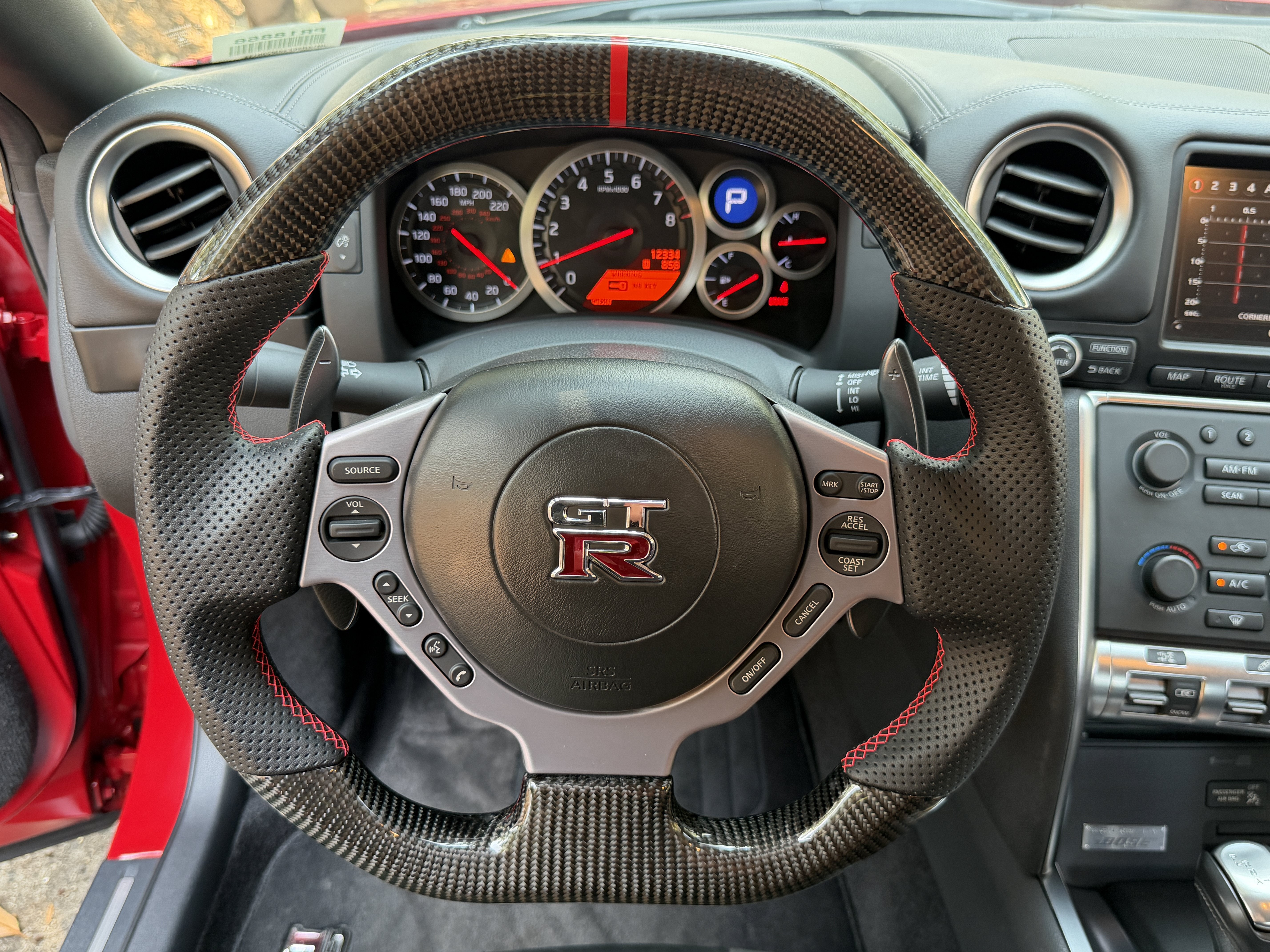 Used 2010 Solid Red Nissan Premium image 18