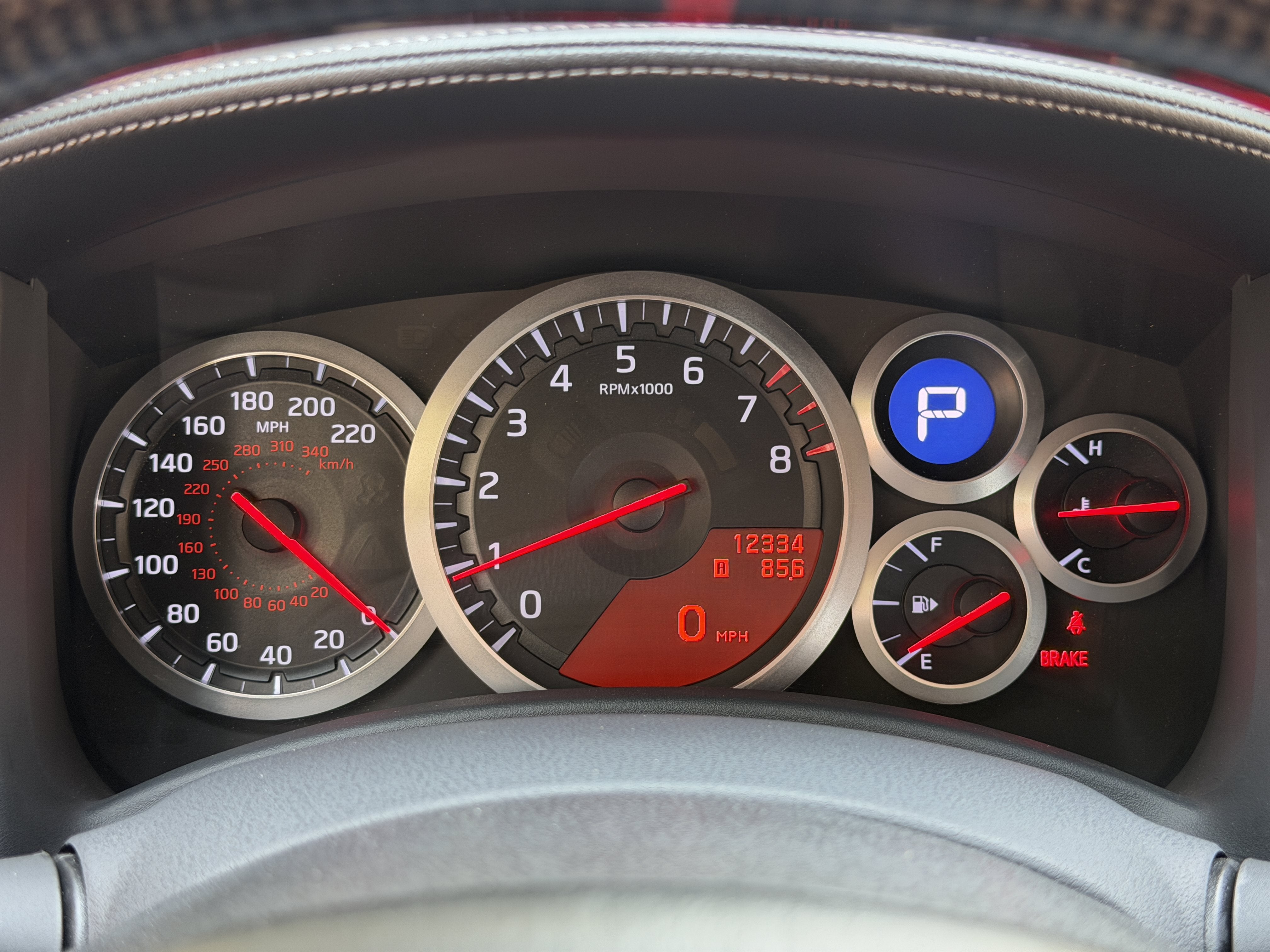 Used 2010 Solid Red Nissan Premium image 21