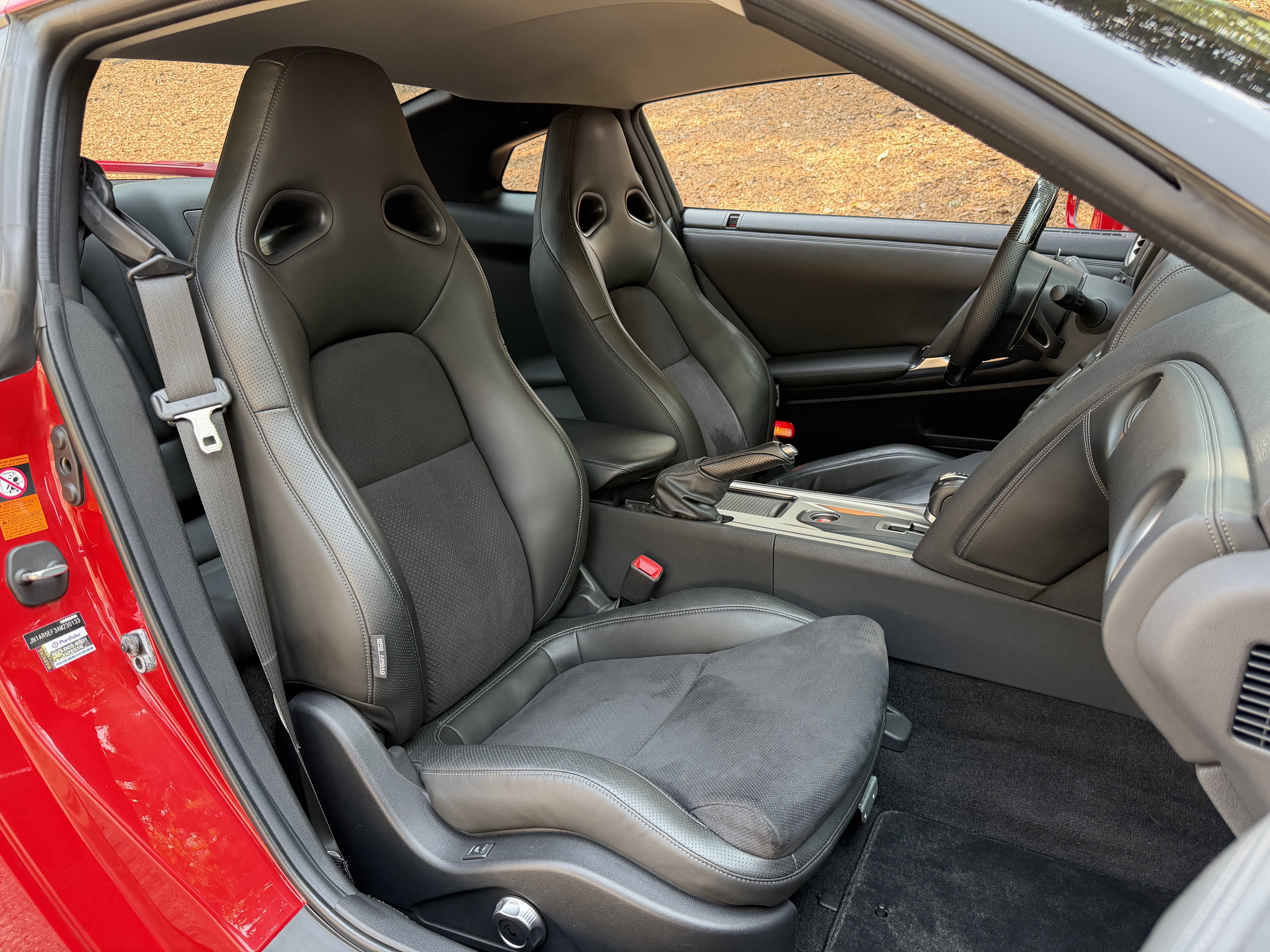 Used 2010 Solid Red Nissan Premium image 38