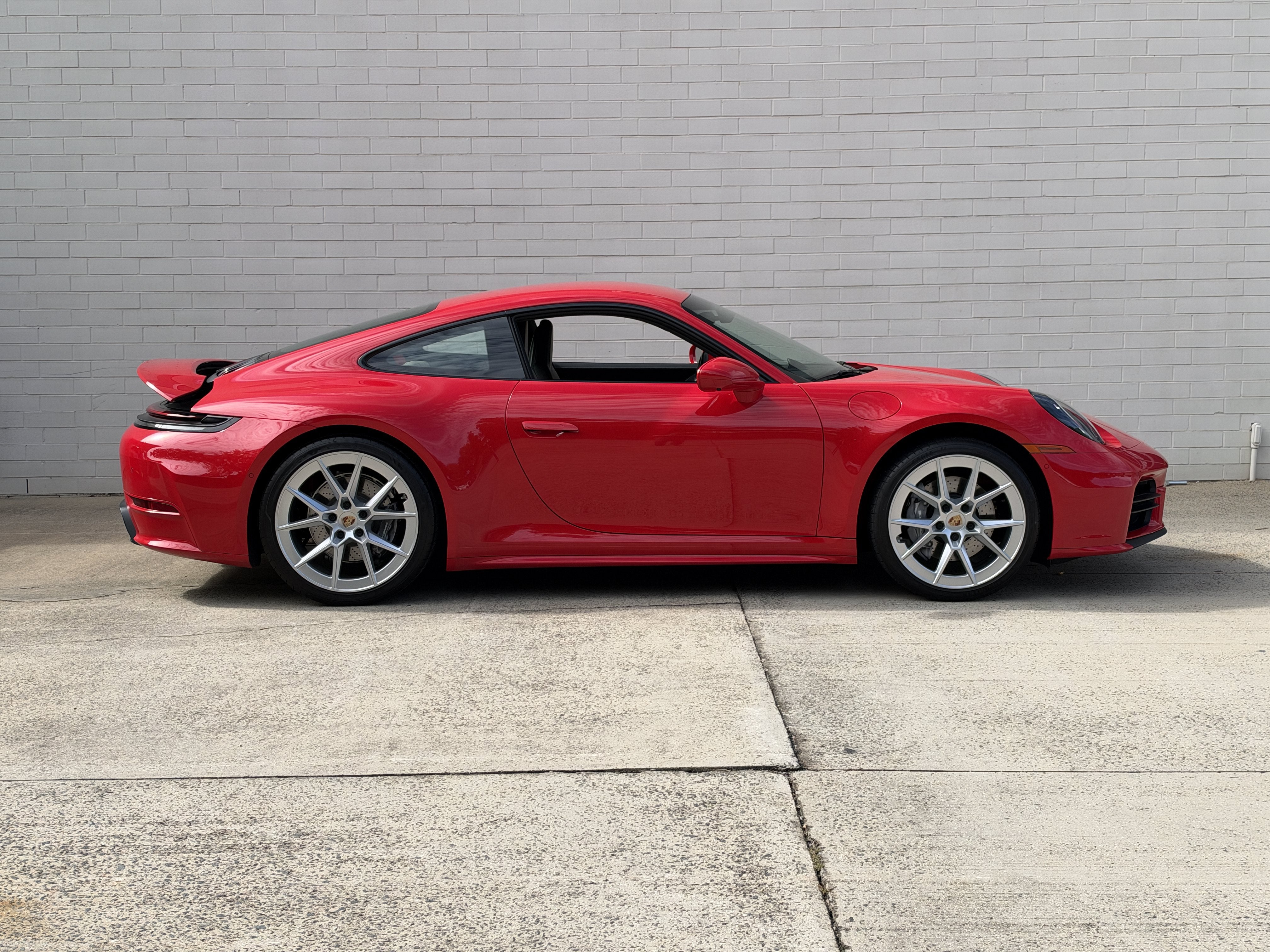 Used 2025 Guards Red Porsche Carrera image 2