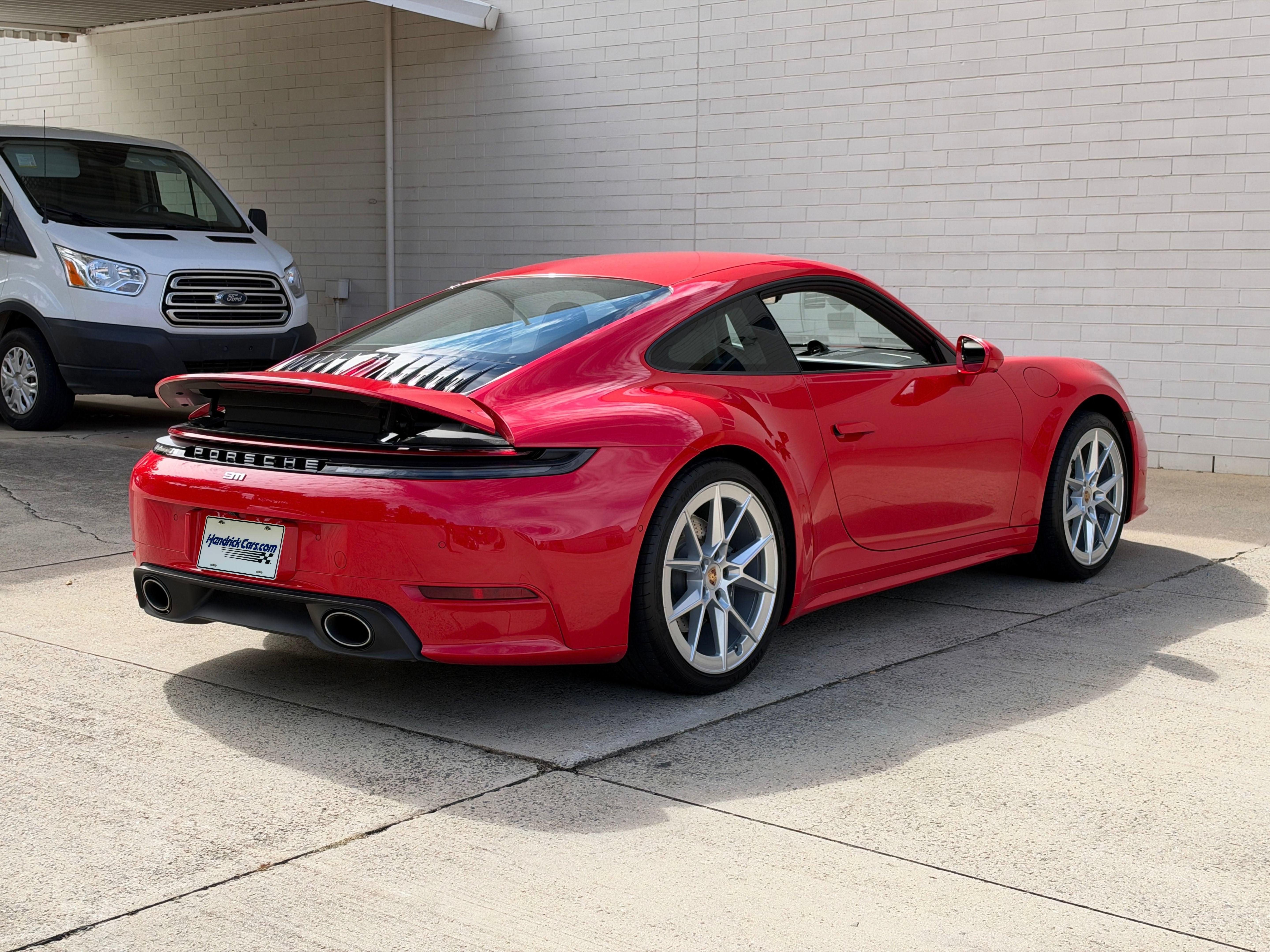 Used 2025 Guards Red Porsche Carrera image 3