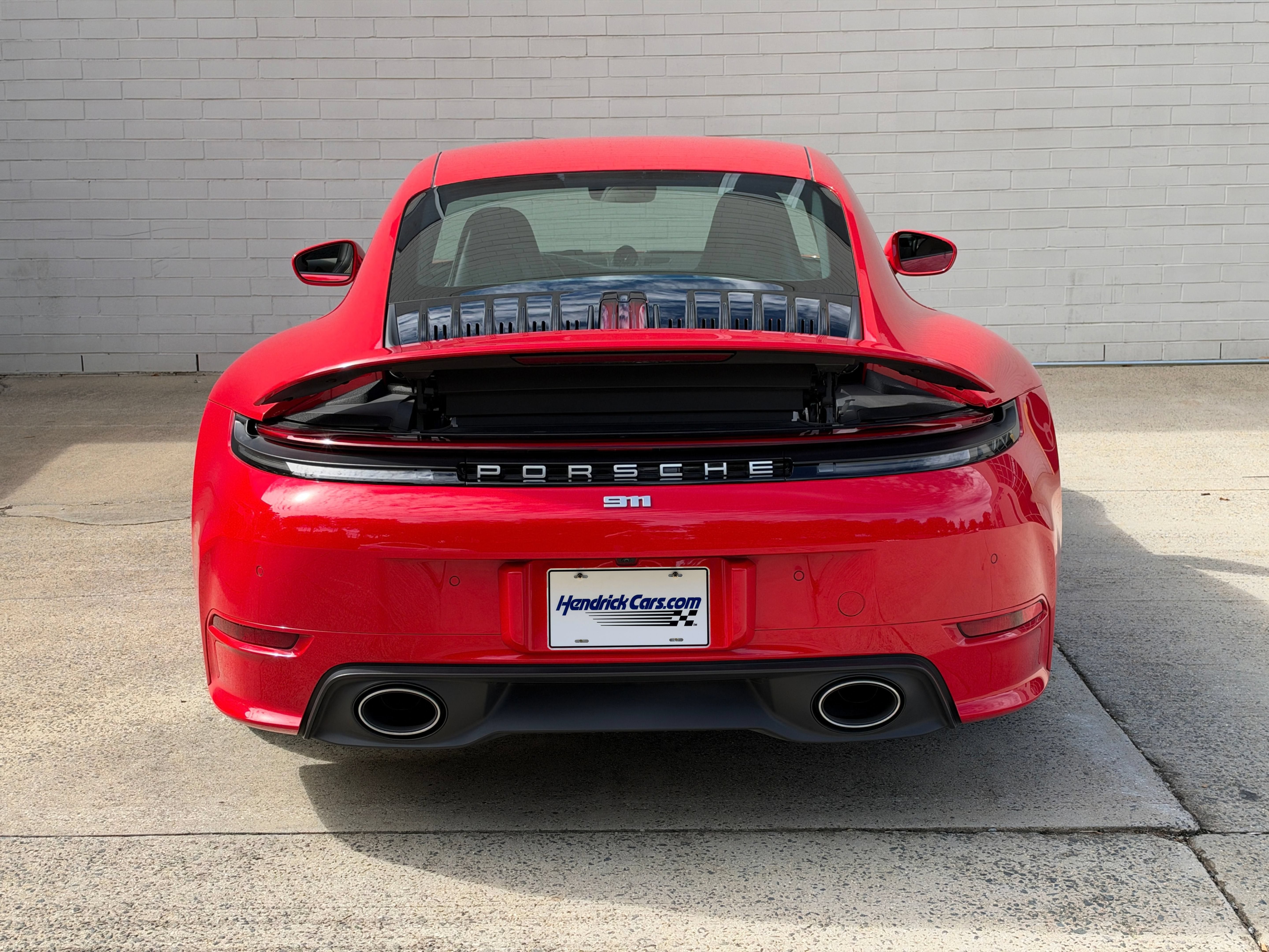 Used 2025 Guards Red Porsche Carrera image 4